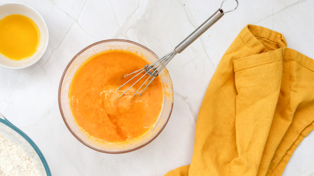 Pumpkin puree mixture whisked together for homemade pumpkin pancakes